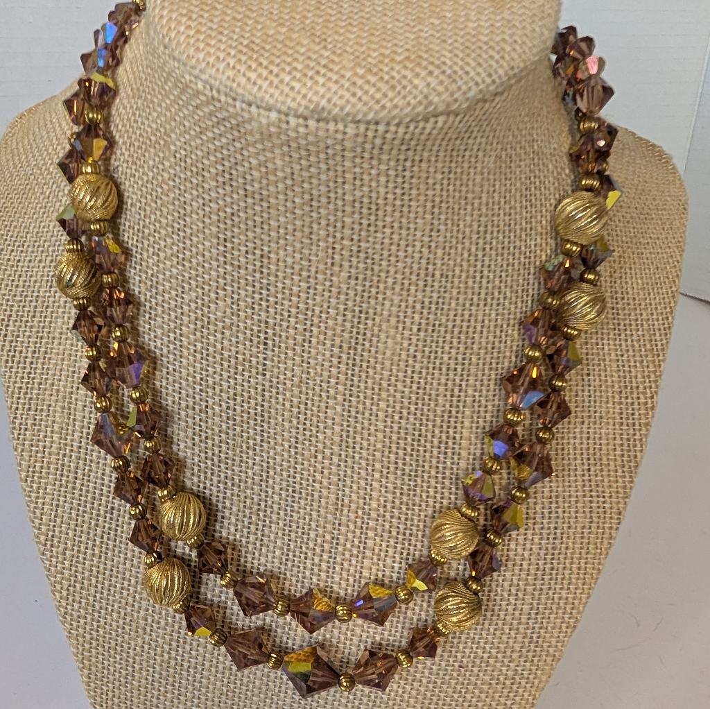 Vintage Aurora Borealis Double Strand Beaded Necklace In Cream Soda Color.